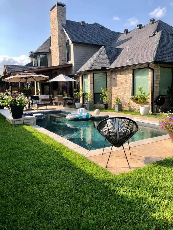 Backyard patio and pool at a finished home